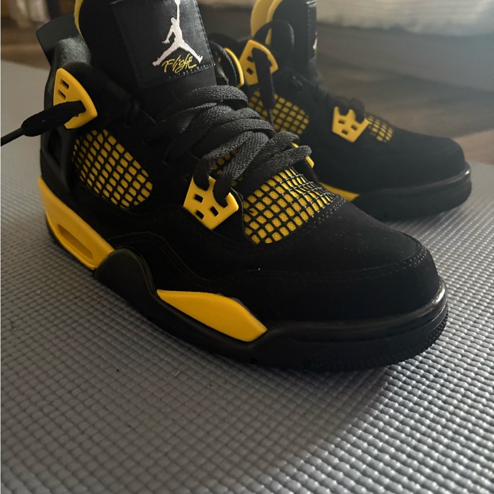 Thunder (Taxi) Jordan 4 Sneakers with Black and Yellow